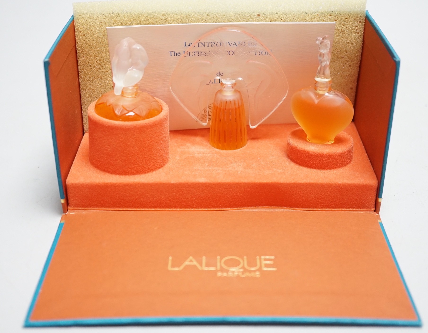 A boxed Lalique Les Introuvables perfume set